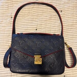 Louis Vuitton Pochette Métis Empreinte leather Navy